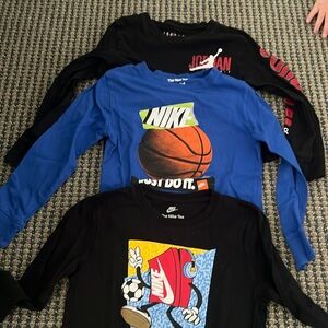 Three Nike shirts size 6/7